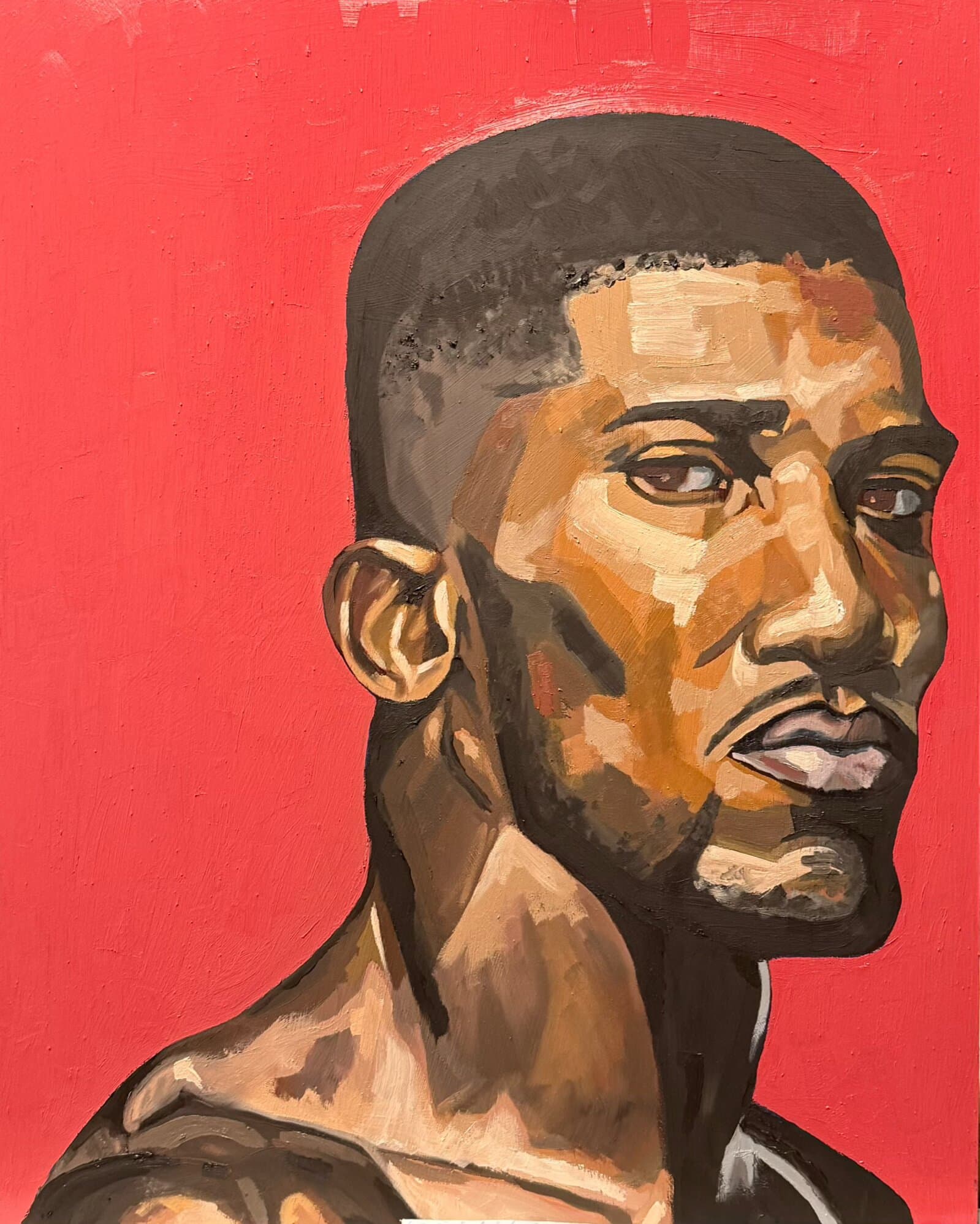Oil portrait of Anthony Joshua on a vivid red background